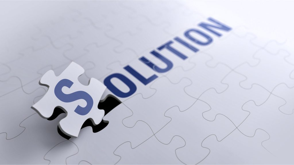 パズルにSOLUTIONと書かれた画像